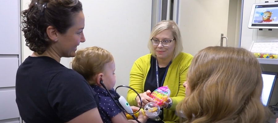family participates in hearing research