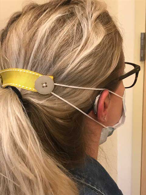 Use a mask extender when wearing hearing aids with a face mask