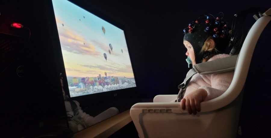 18-month-old infant during passive video watching to get a resting state measure of neural connectivity via fNIRS